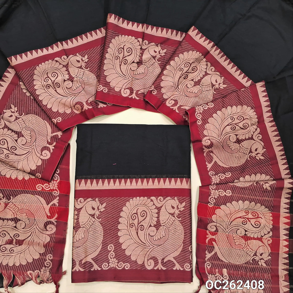 Black pure mercerized handloom cotton unstitched salwar material, peacock weaving design on daman,(lining needed)bottom included with top,full length pure mercerized handloom cotton dupatta with borders. OC262408
