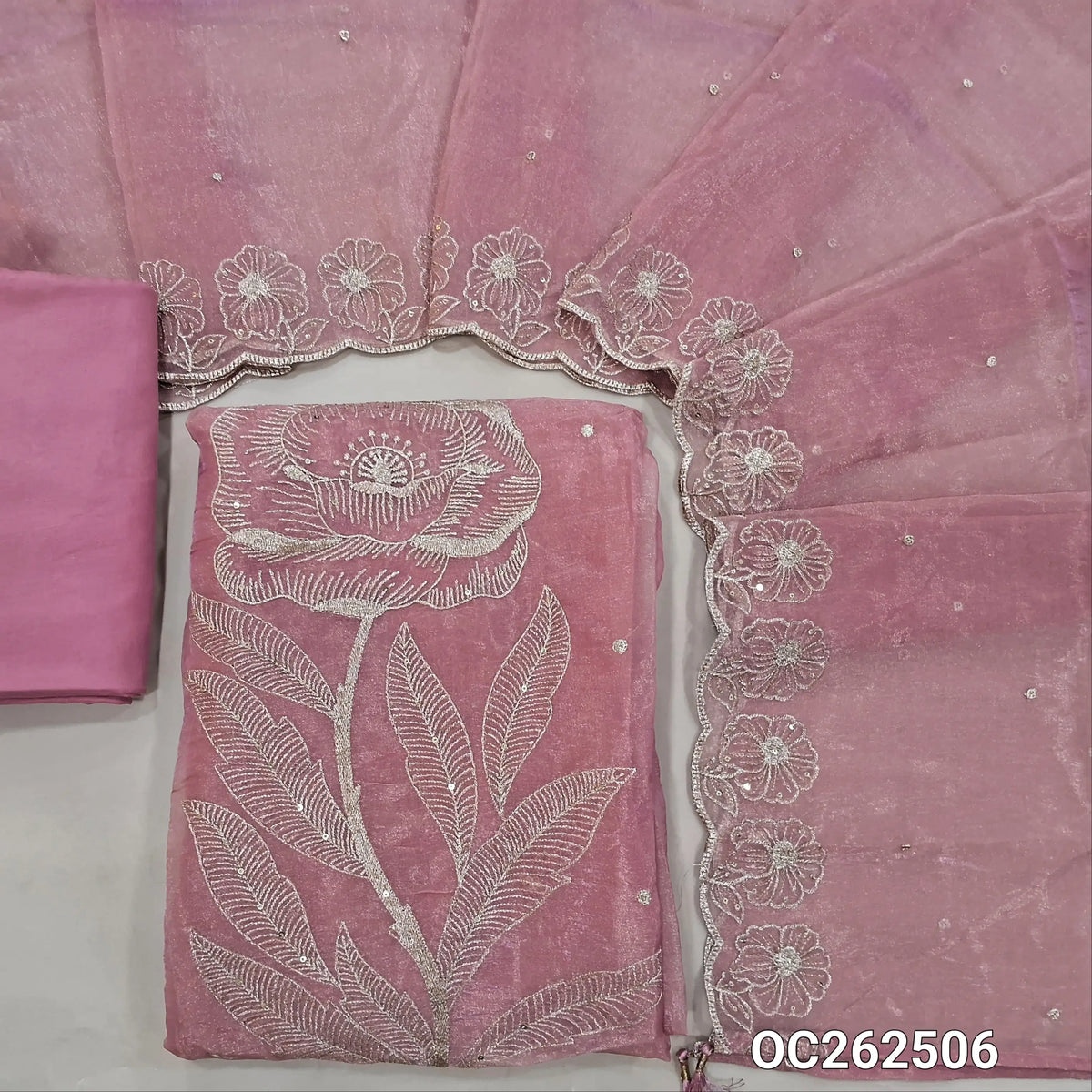 Pastel pink with golden tint crinkled tissue organza silk unstitched salwar material,zari embroidery & sequins on front,(lining needed)silky fabric provided for  bottom & lining, tissue organza silk dupatta with embroidery & scallop borders. OC262506
