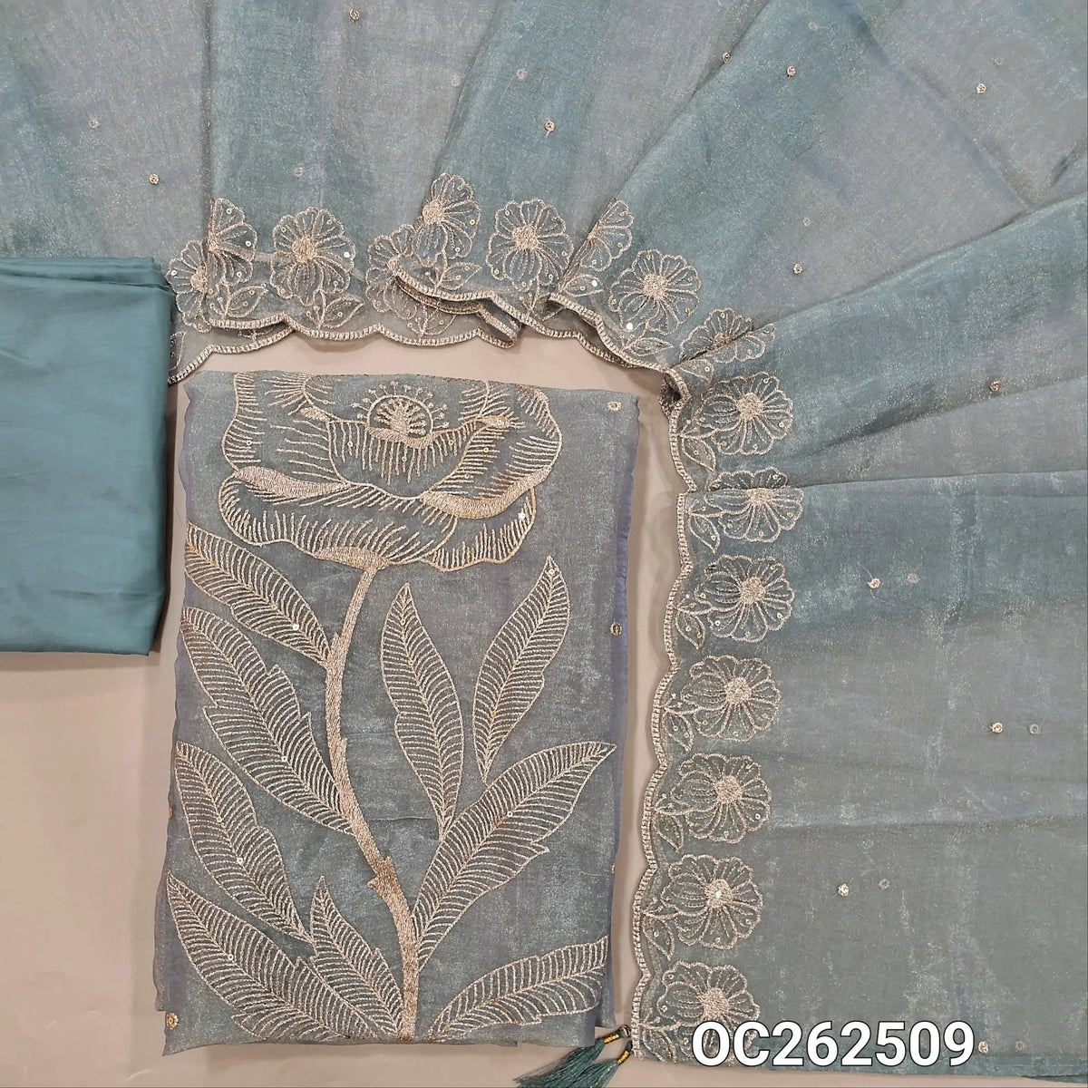 Blueish grey with golden tint crinkled tissue organza silk unstitched salwar material,zari embroidery & sequins on front,(lining needed)silky fabric provided for  bottom & lining, tissue organza silk dupatta with embroidery & scallop borders. OC262509
