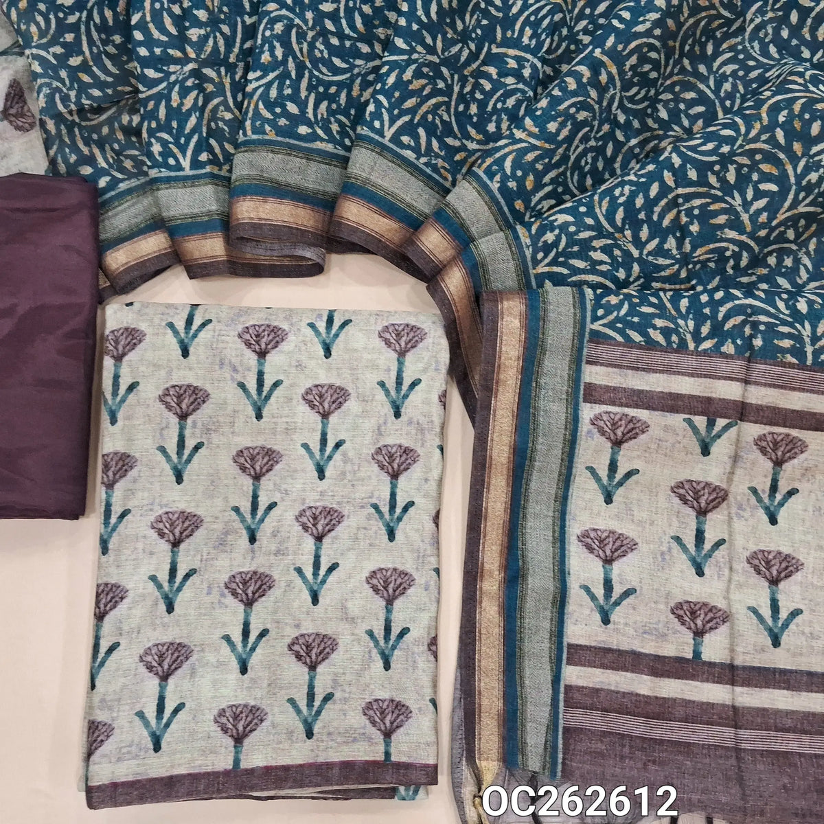 Light beige viscous maheshwari unstitched salwar material,printed all over,(Lining Needed)dark mauve silky bottom,printed full length viscous maheshwari dupatta with pallu. OC262612