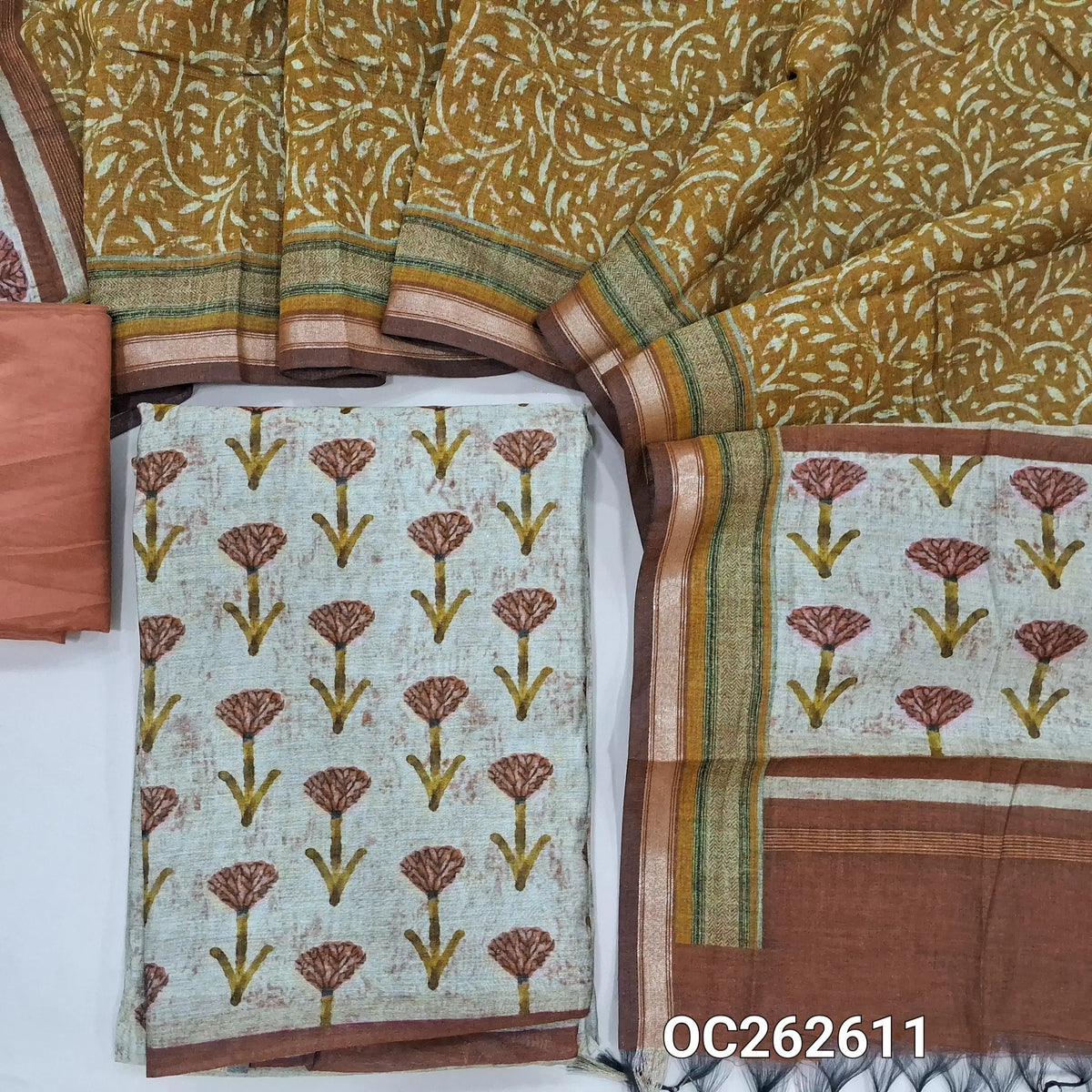 Light beige viscous maheshwari unstitched salwar material,printed all over,(Lining Needed)brick red silky bottom,printed full length viscous maheshwari dupatta with pallu. OC262611