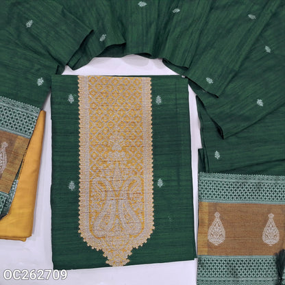 Dark green and mehandhi yellow premium raw silk unstitched salwar material, antique gold zari weaving on yoke and daman, buttas on front (Textured, Lining Needed) contrast silky bottom, raw silk dupatta with benarasi zari weaving. OC262709