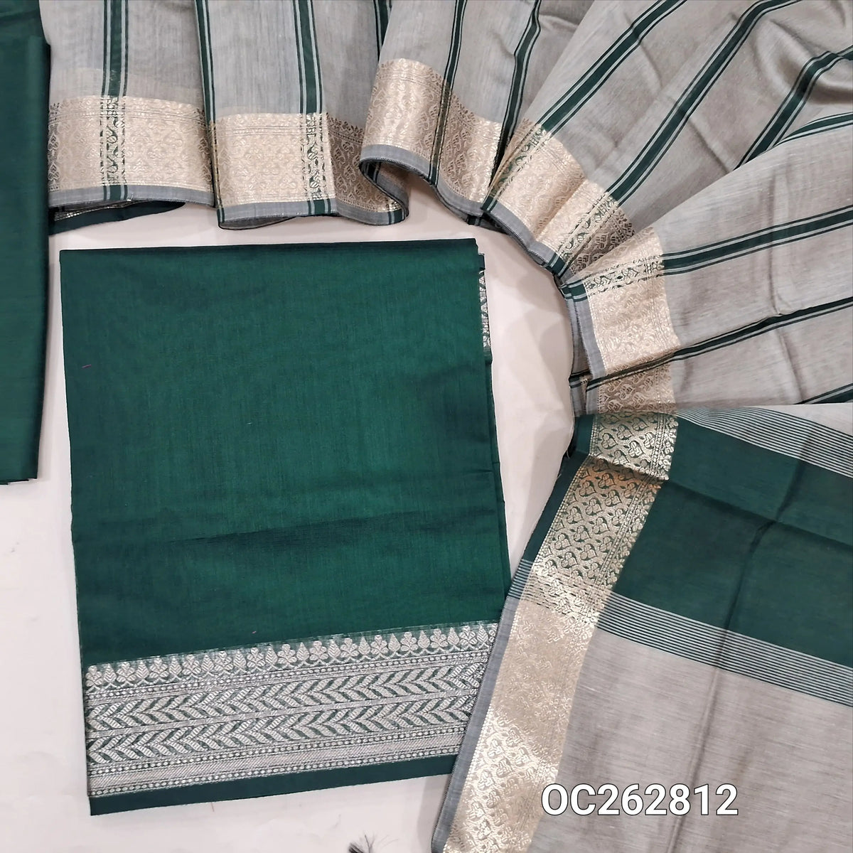 Dark green semi Maheshwari silk cotton unstitched salwar material, antique gold zari daman (Lining Needed) silk cotton bottom, printed stripes on silk cotton dupatta with zari borders. OC262812