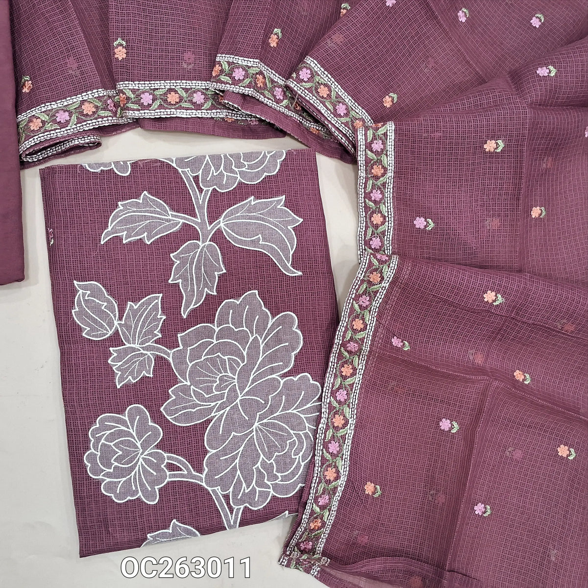 Dark pink kota unstitched salwar material, rich applique work on panel, embroidery on front (Thin, Lining Needed)matching spun cottonbottom, kota dupatta with embroidery work. OC263011