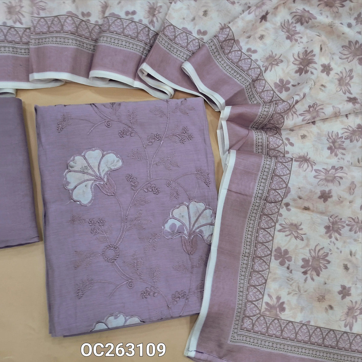 Lavender mul chanderi unstitched salwar material, applique work on panel, embroidery on front (Thin, Soft, Lining Needed) matching santoon bottom, silk cotton digital printed dupatta. OC263109