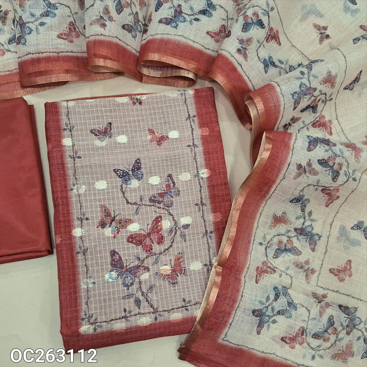 Maroon kota digital printed unstitched salwar material, zari woven buttas all over (Thin, Lightweight, Lining Needed) matching silky bottom, printed kota dupatta. OC263112