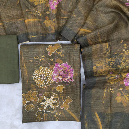 Olive green abstract printed premium tussar silk unstitched salwar material, hand embroidered on yoke(thin fabric, lining needed)rich daman, matching santoon bottom, floral printed premium tussar silk dupatta. ODE SP242502