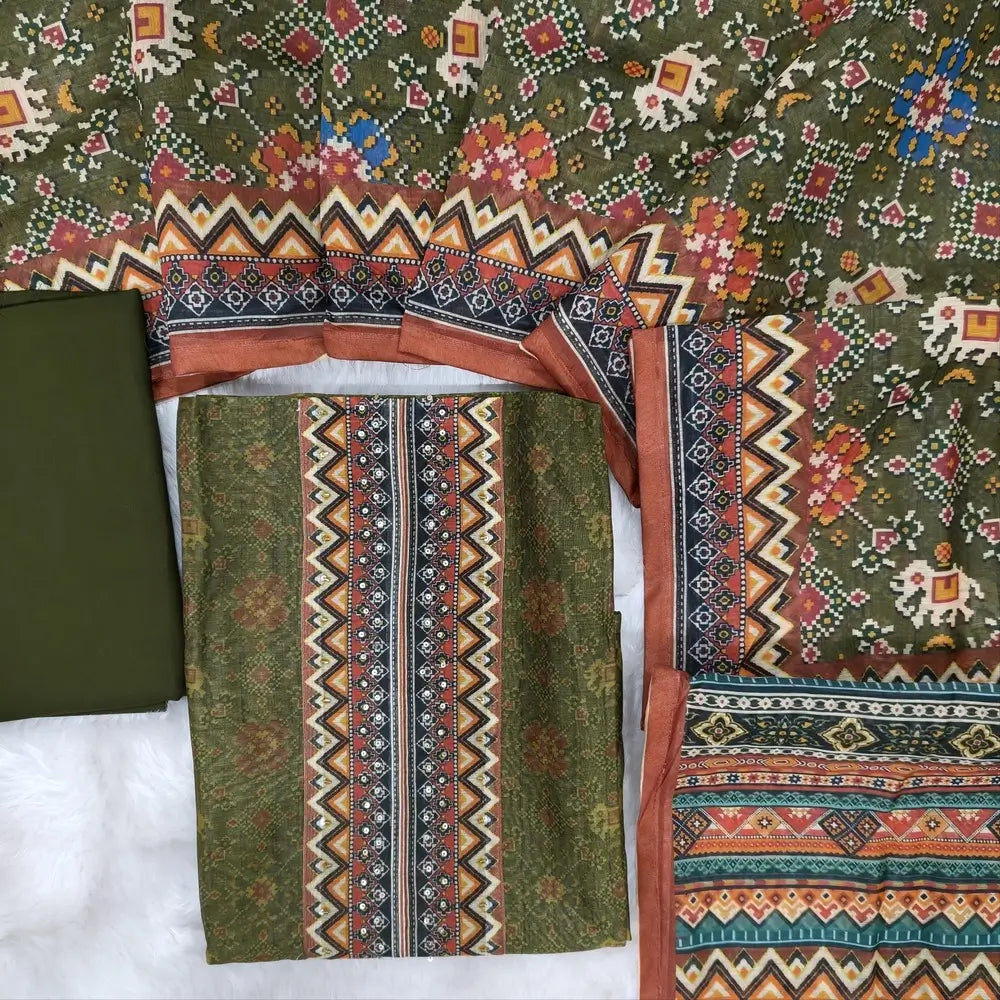Digital printed olive Green silk cotton unstitched salwar material (lining needed) sequins, bead work on yoke, matching spun cotton bottom, digital printed silk cotton dupatta. NV253002
