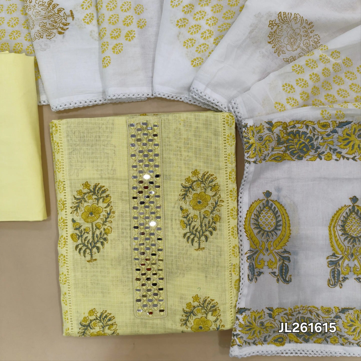 Pastel yellow block printed kota cotton unstitched salwar material, real mirror work on yoke,panel design (lining needed)cotton bottom,block printed mul cotton dupatta with lace tapping. JL261615