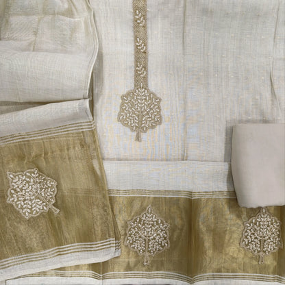 Rich beige premium silk cotton unstitched salwar material,zarodzi and zari work on yoke, zari buttas all over,(lining needed)rich daman, spun cotton bottom, designer premium silk cotton dupatta with rich pallu. JL261701