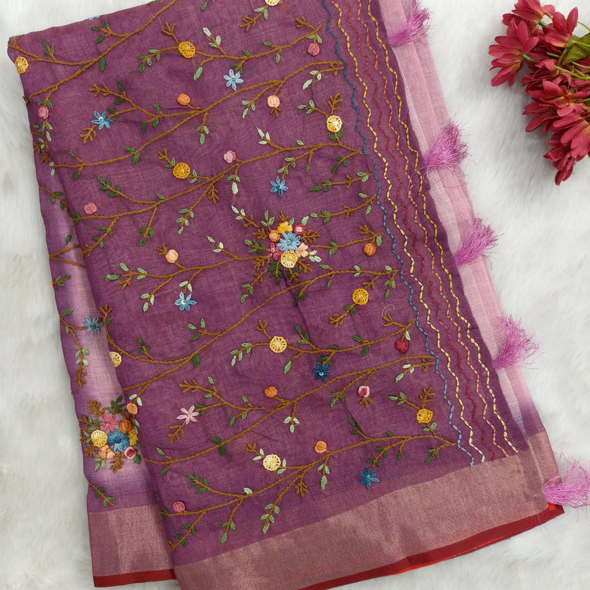 Purple with golden tint premium dual shaded tissue linen saree, with rich hand embroidery work all over(texture)double side tissue borders,contrast pallu, with rich hand embroidery and sequins work, running blouse with embroidery & borders. NS265