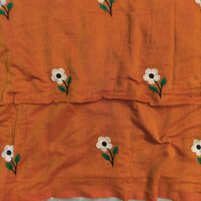 Rust orange mul mul cotton saree(soft, light weight)with embroidery all over, handmade tassles in pallu, running blouse. NS277