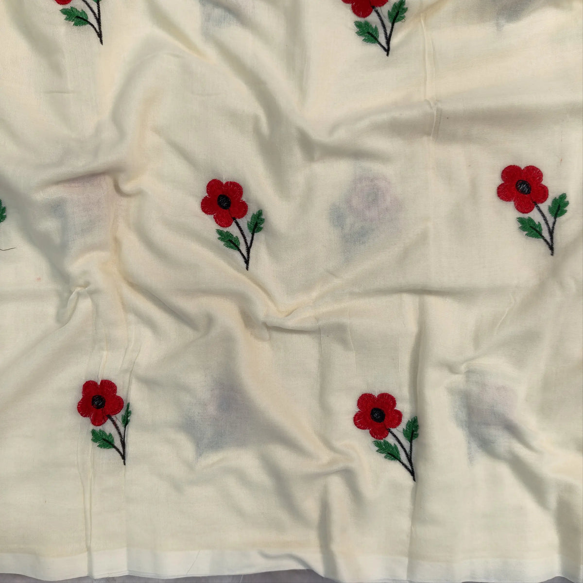 Off white mul mul cotton saree(soft, light weight)with embroidery all over, handmade tassles in pallu, running blouse. NS278