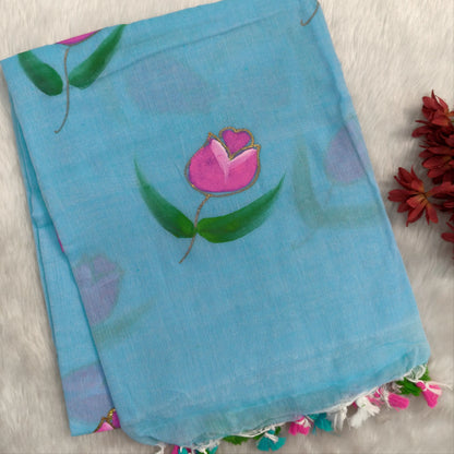 Sky blue soft mul mul cotton saree(soft, light weight)with hand brush paint work all over,handmade tassles in pallu, running blouse. NS283