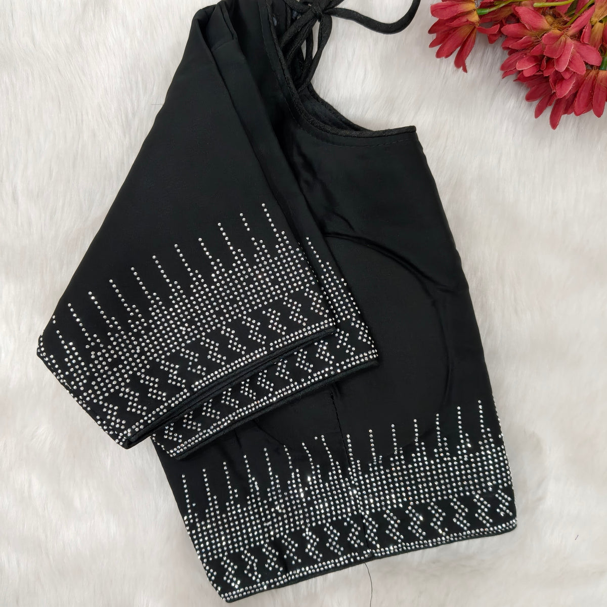 CODE WS1132 : Black designer crepe silk saree with heavy and neat dew drop stone work for borders and pallu, readymade blouse (can be altered upto size 40).