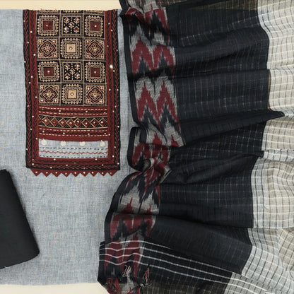 Light grey south handloom cotton unstitched salwar material, ajrak block printed yoke with thread& sequins work(lining needed)black cotton bottom, south handloom cotton dupatta with ikat woven borders. AG260815