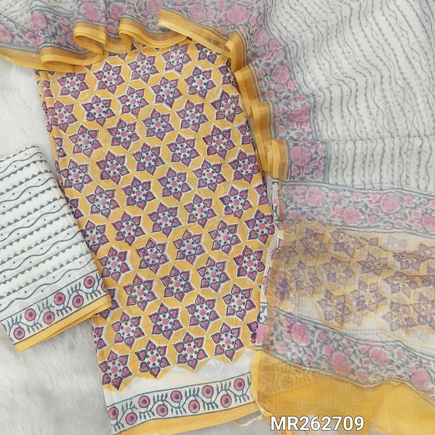Pastel yellow hand block printed pure mul cotton unstitched salwar material, (lining needed)hand block printed cotton bottom, block printed soft kota doria dupatta. (TAPINGS NEEDED, INCONSISTENT PRINTS ARE NOT DEFECTS) MR262709