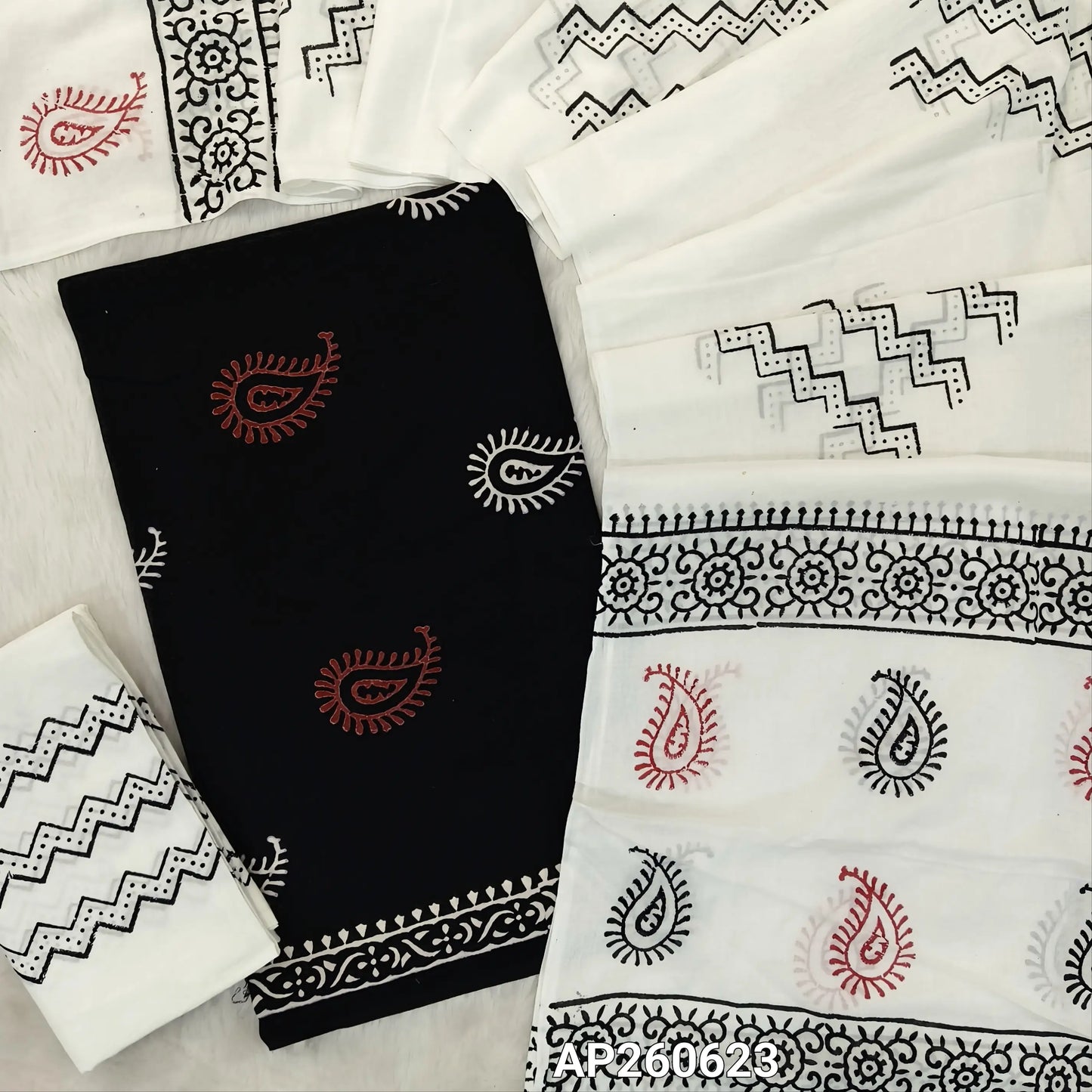 Black hand block printed pure mul cotton unstitched salwar material,(lining optional)hand block printed white cotton bottom,block printed full length mul cotton dupatta. (TAPINGS NEEDED, INCONSISTENT PRINTS ARE NOT DEFECTS) AP260623