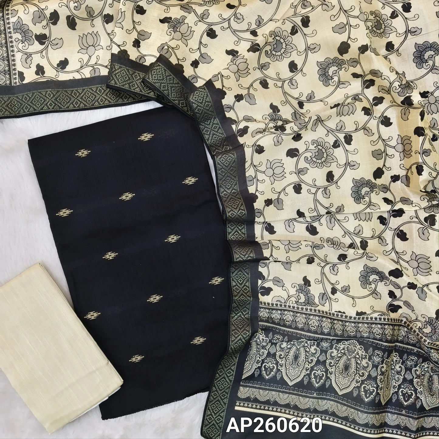 Black slub silk cotton unstitched salwar material, thread buttas all over(lining needed)half white silk cotton bottom,digital printed fancy silk cotton dupatta with zari woven borders. AP260620