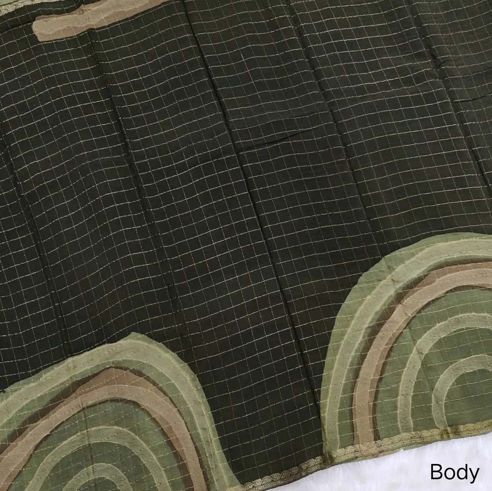 Dark Olive Green Viscous Chanderi silk saree with shibori prints all over and zari checks all over, thin zari woven borders and running viscous chanderi zari woven blouse. NS57