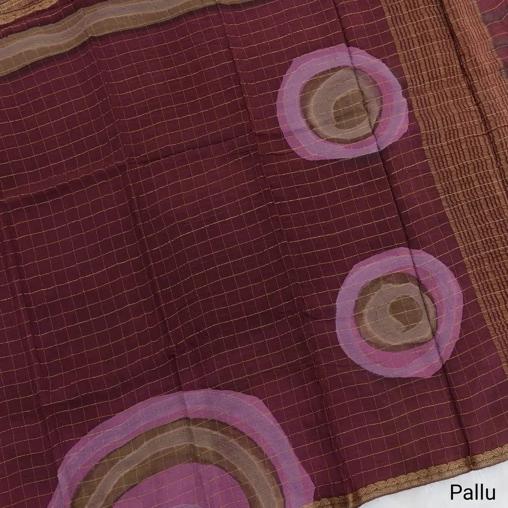 Dark Maroonish Pink Viscous Chanderi silk saree with shibori prints all over and zari checks all over, thin zari woven borders and running viscous chanderi zari woven blouse. NS56