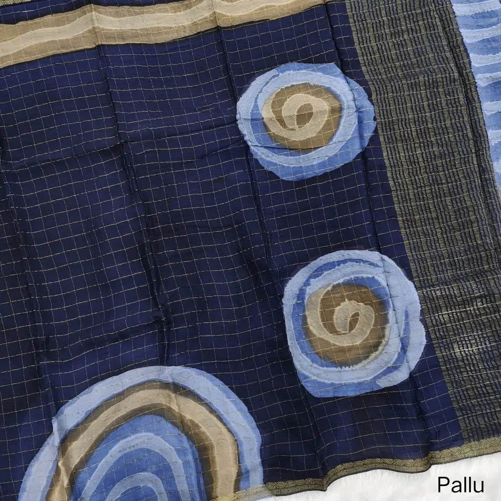 Dark Blue Viscous Chanderi silk saree with shibori prints all over and zari checks all over, thin zari woven borders and running viscous chanderi zari woven blouse. NS59