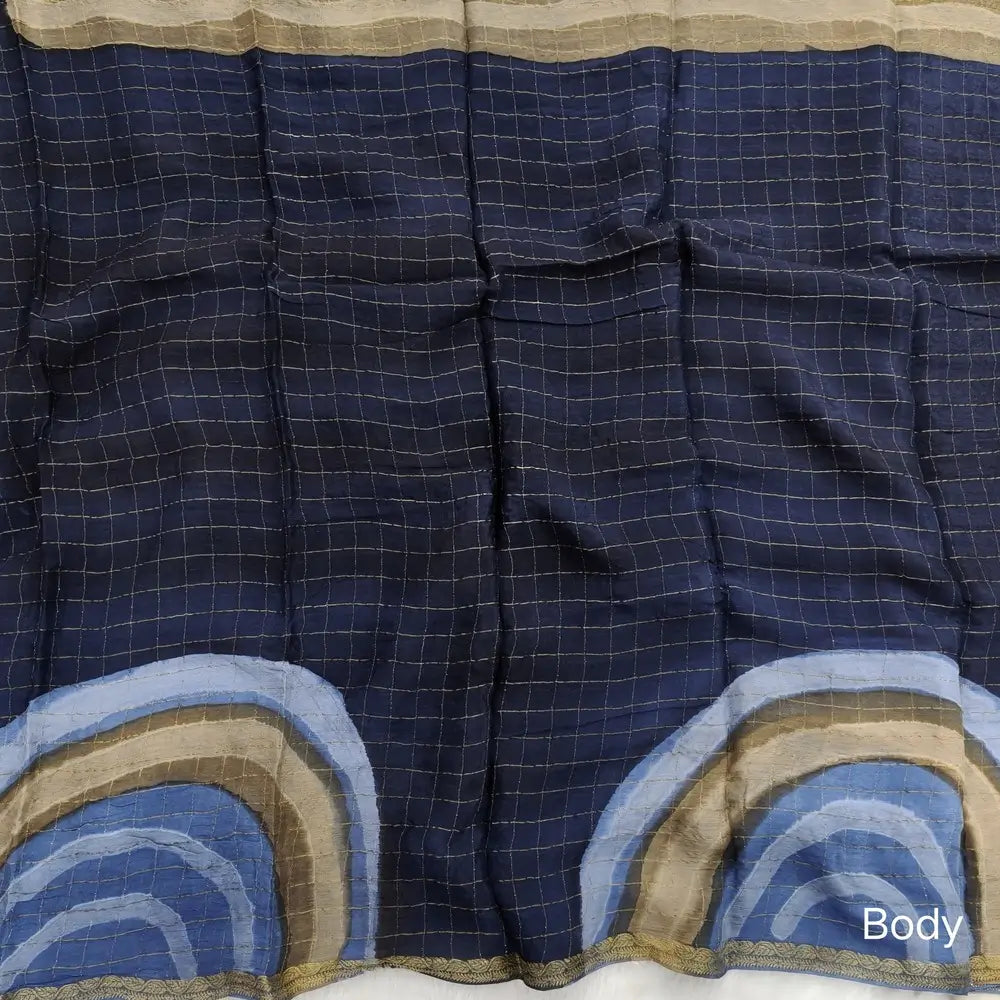 Dark Blue Viscous Chanderi silk saree with shibori prints all over and zari checks all over, thin zari woven borders and running viscous chanderi zari woven blouse. NS59
