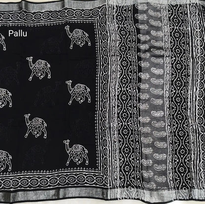 Black block printed linen cotton saree with double side silver zari borders (lightweight,soft) printed pallu with silver zari stripes, plain running blouse with borders. NS62