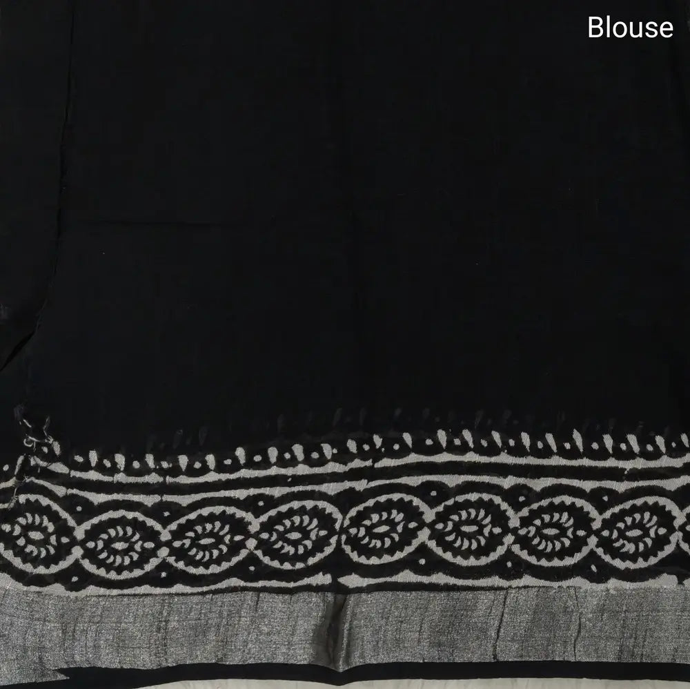 Black block printed linen cotton saree with double side silver zari borders (lightweight,soft) printed pallu with silver zari stripes, plain running blouse with borders. NS62