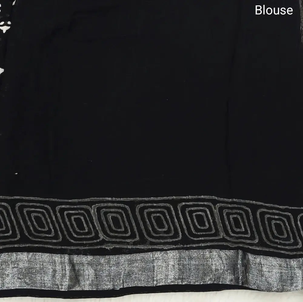 Black block printed linen cotton saree with double side silver zari borders (lightweight,soft) printed pallu with silver zari stripes, plain running blouse with borders. NS60