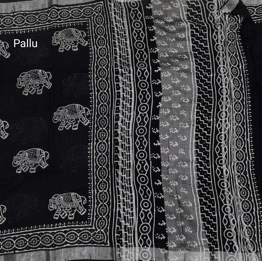 Black block printed linen cotton saree with double side silver zari borders (lightweight,soft) printed pallu with silver zari stripes, plain running blouse with borders. NS63