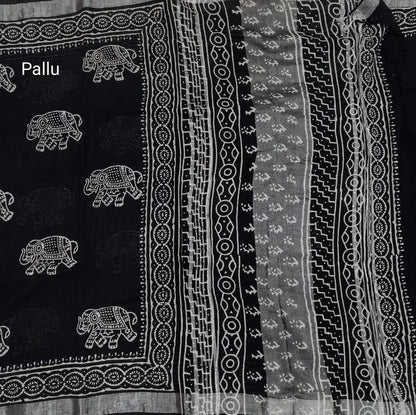 Black block printed linen cotton saree with double side silver zari borders (lightweight,soft) printed pallu with silver zari stripes, plain running blouse with borders. NS63