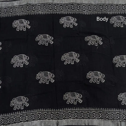 Black block printed linen cotton saree with double side silver zari borders (lightweight,soft) printed pallu with silver zari stripes, plain running blouse with borders. NS63