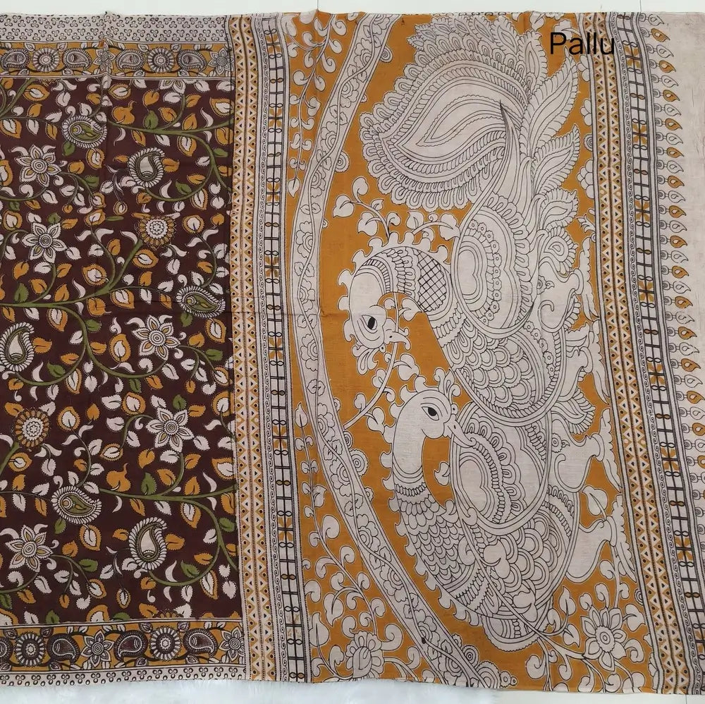 Dark maroon kalamkari hand block printed cotton saree, printed pallu and kalamkari printed blouse with borders. INCONSISTENT PRINTS AND DYES ARE NOT DEFECTS.NS64
