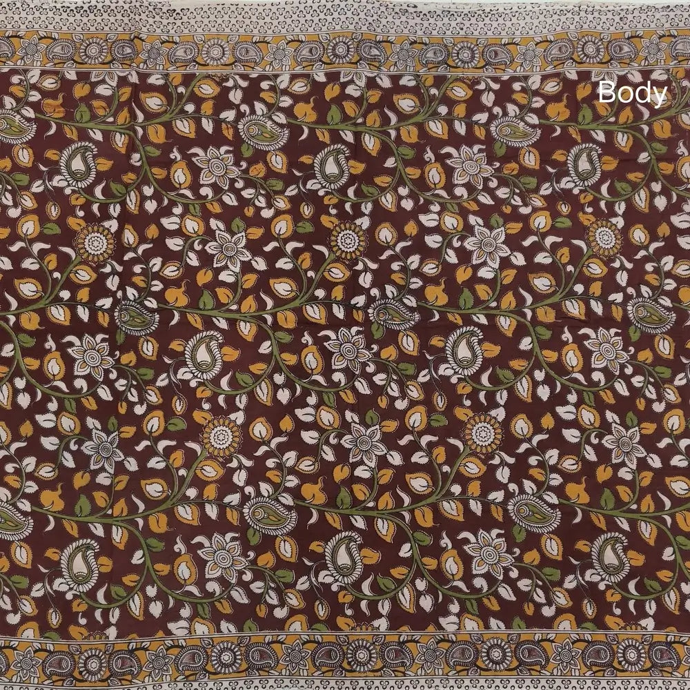 Dark maroon kalamkari hand block printed cotton saree, printed pallu and kalamkari printed blouse with borders. INCONSISTENT PRINTS AND DYES ARE NOT DEFECTS.NS64