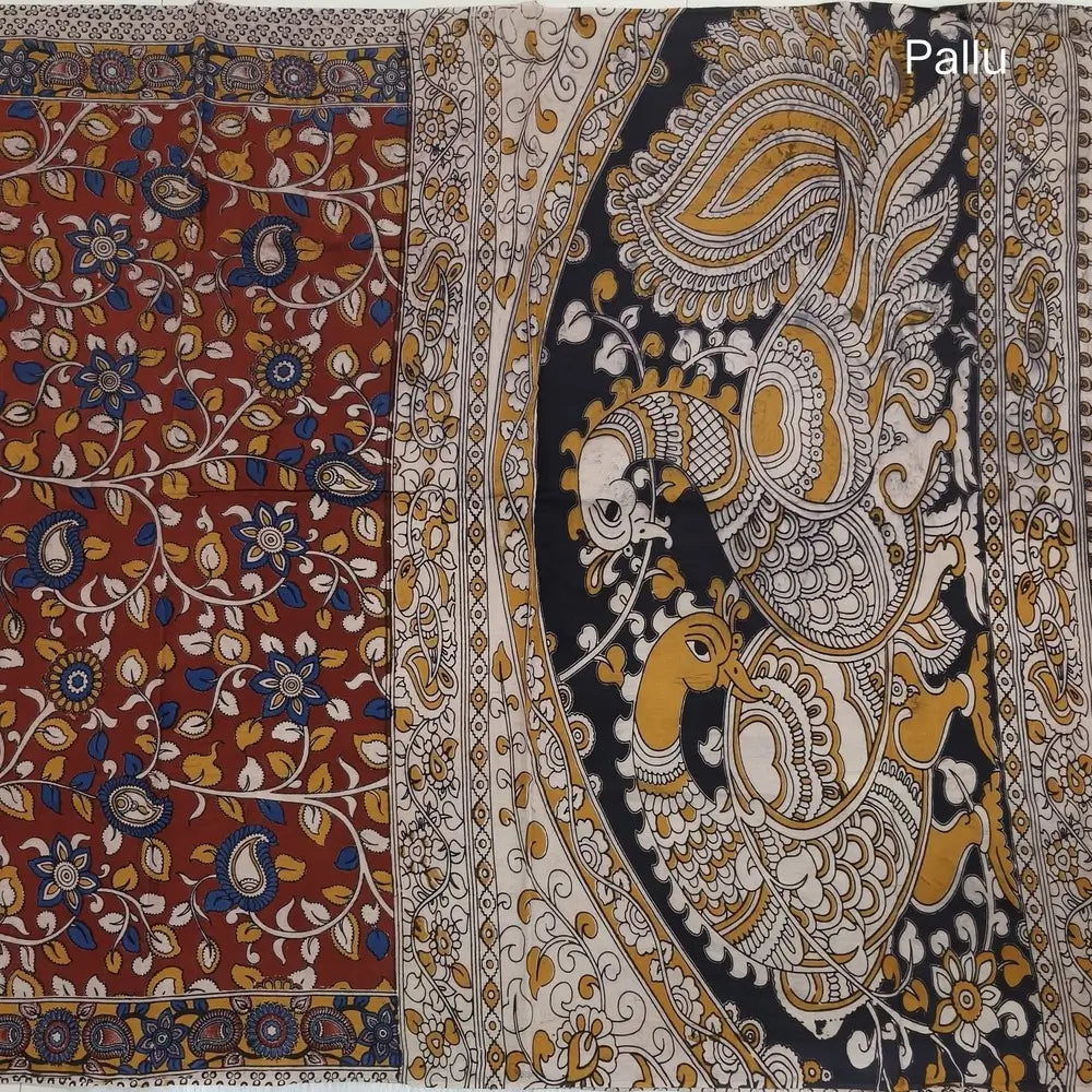 Reddish maroon kalamkari hand block printed cotton saree, printed pallu and kalamkari printed blouse with borders. INCONSISTENT PRINTS AND DYES ARE NOT DEFECTS.NS65