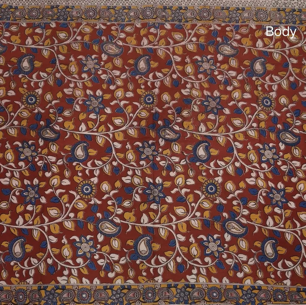 Reddish maroon kalamkari hand block printed cotton saree, printed pallu and kalamkari printed blouse with borders. INCONSISTENT PRINTS AND DYES ARE NOT DEFECTS.NS65