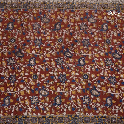 Reddish maroon kalamkari hand block printed cotton saree, printed pallu and kalamkari printed blouse with borders. INCONSISTENT PRINTS AND DYES ARE NOT DEFECTS.NS65