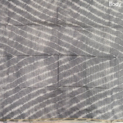 Light grey with pastel pink shibori printed soft silk cotton saree with zari checks all over, contrast animal prints on pallu, contrast running blouse with zari chceks and borders.NS67