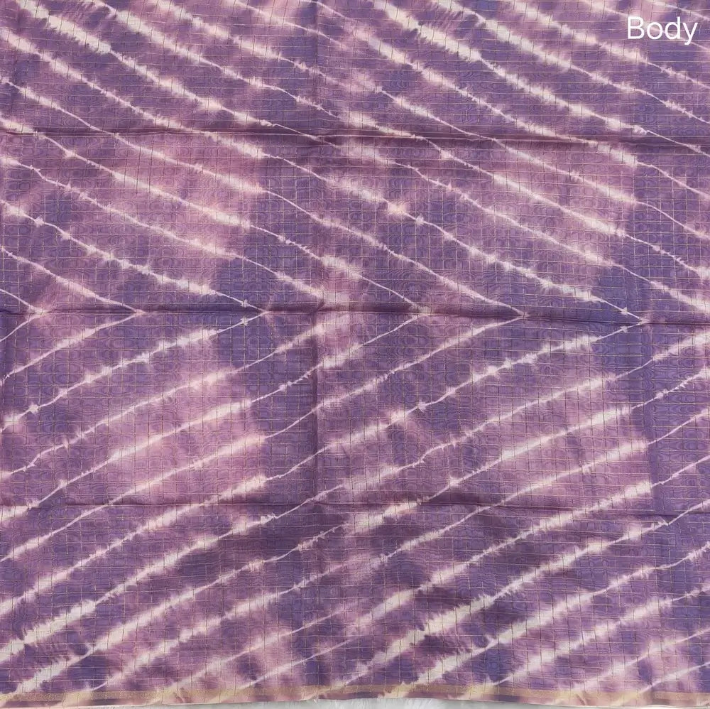Purple with pink shibori printed soft silk cotton saree with zari checks all over, contrast animal prints on pallu, contrast running blouse with zari chceks and borders.NS71