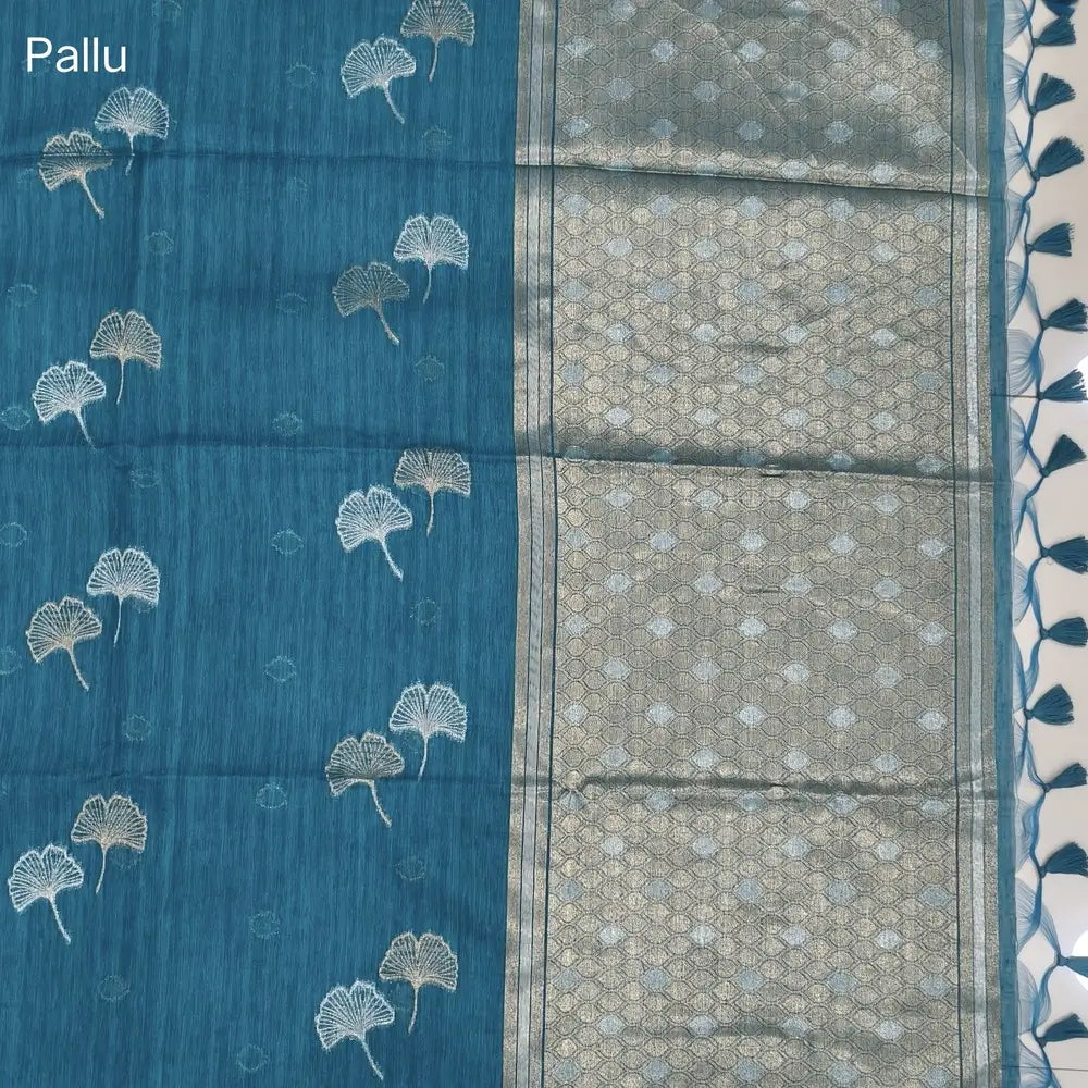 Turquoise blue premium tussar jamdani saree with gold and silver zari weaving all over, rich weaving on pallu, running blouse with zari woven buttas and borders. NS76