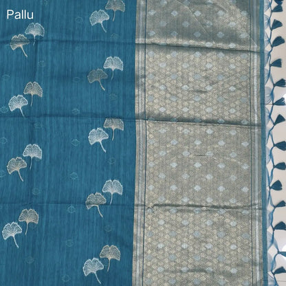 Turquoise blue premium tussar jamdani saree with gold and silver zari weaving all over, rich weaving on pallu, running blouse with zari woven buttas and borders. NS76