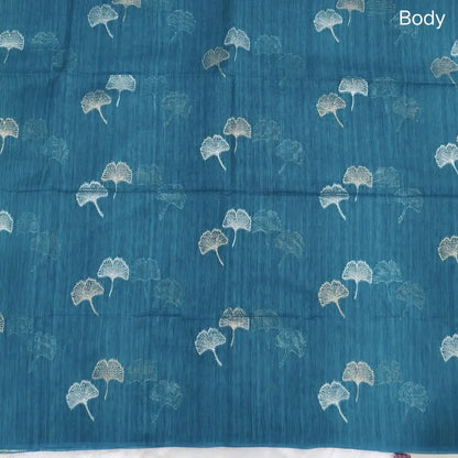 Turquoise blue premium tussar jamdani saree with gold and silver zari weaving all over, rich weaving on pallu, running blouse with zari woven buttas and borders. NS76