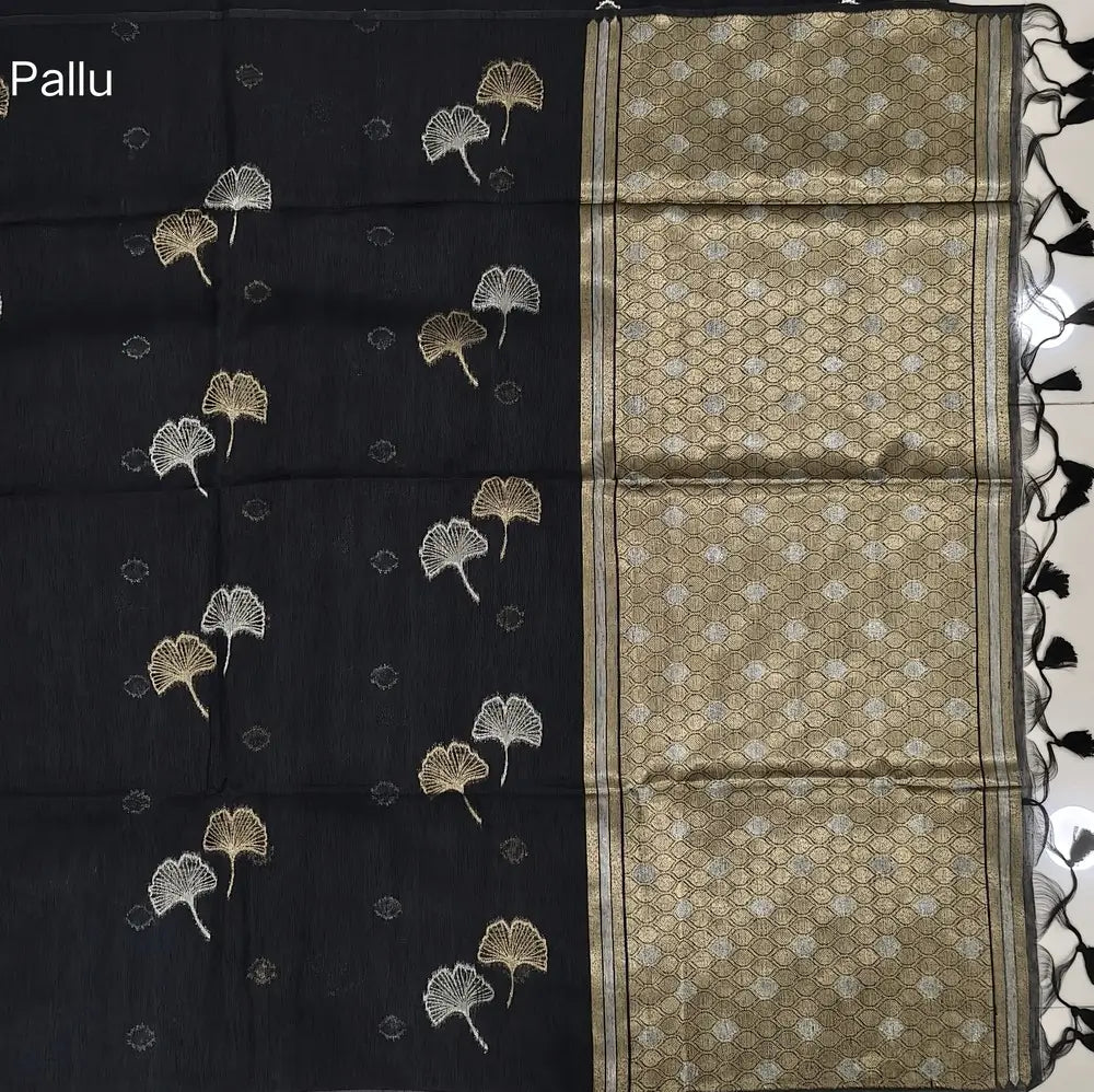 Black Premium tussar jamdani saree with gold and silver zari weaving all over, rich weaving on pallu, running blouse with zari woven buttas and borders. NS73