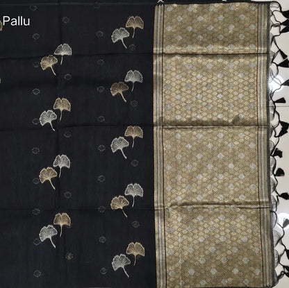 Black Premium tussar jamdani saree with gold and silver zari weaving all over, rich weaving on pallu, running blouse with zari woven buttas and borders. NS73
