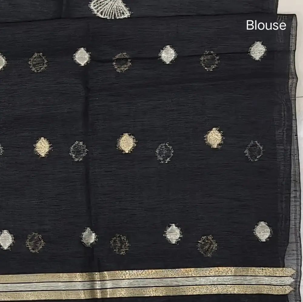 Black Premium tussar jamdani saree with gold and silver zari weaving all over, rich weaving on pallu, running blouse with zari woven buttas and borders. NS73
