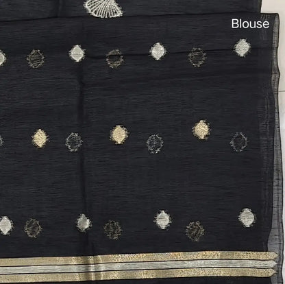 Black Premium tussar jamdani saree with gold and silver zari weaving all over, rich weaving on pallu, running blouse with zari woven buttas and borders. NS73