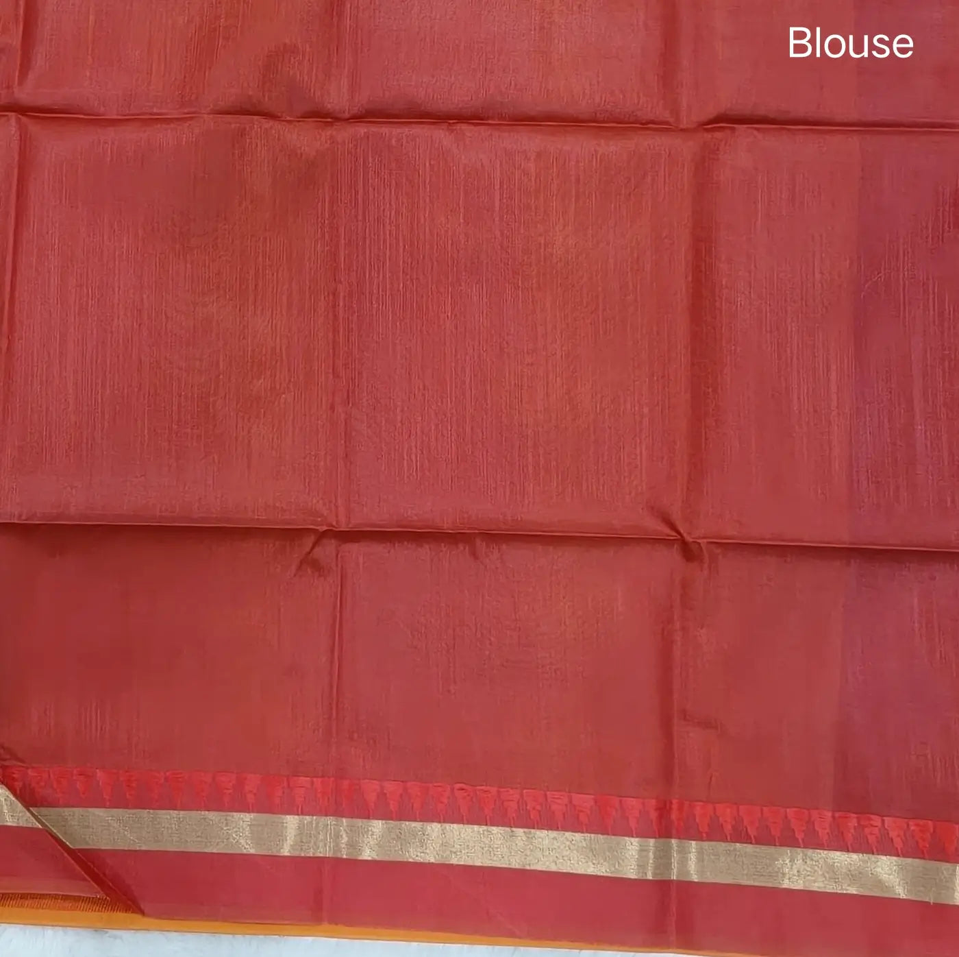 Light orange with reddish maroon silk cotton saree with thread woven double side borders, zari striped short pallu and contrast blouse with borders. NS82