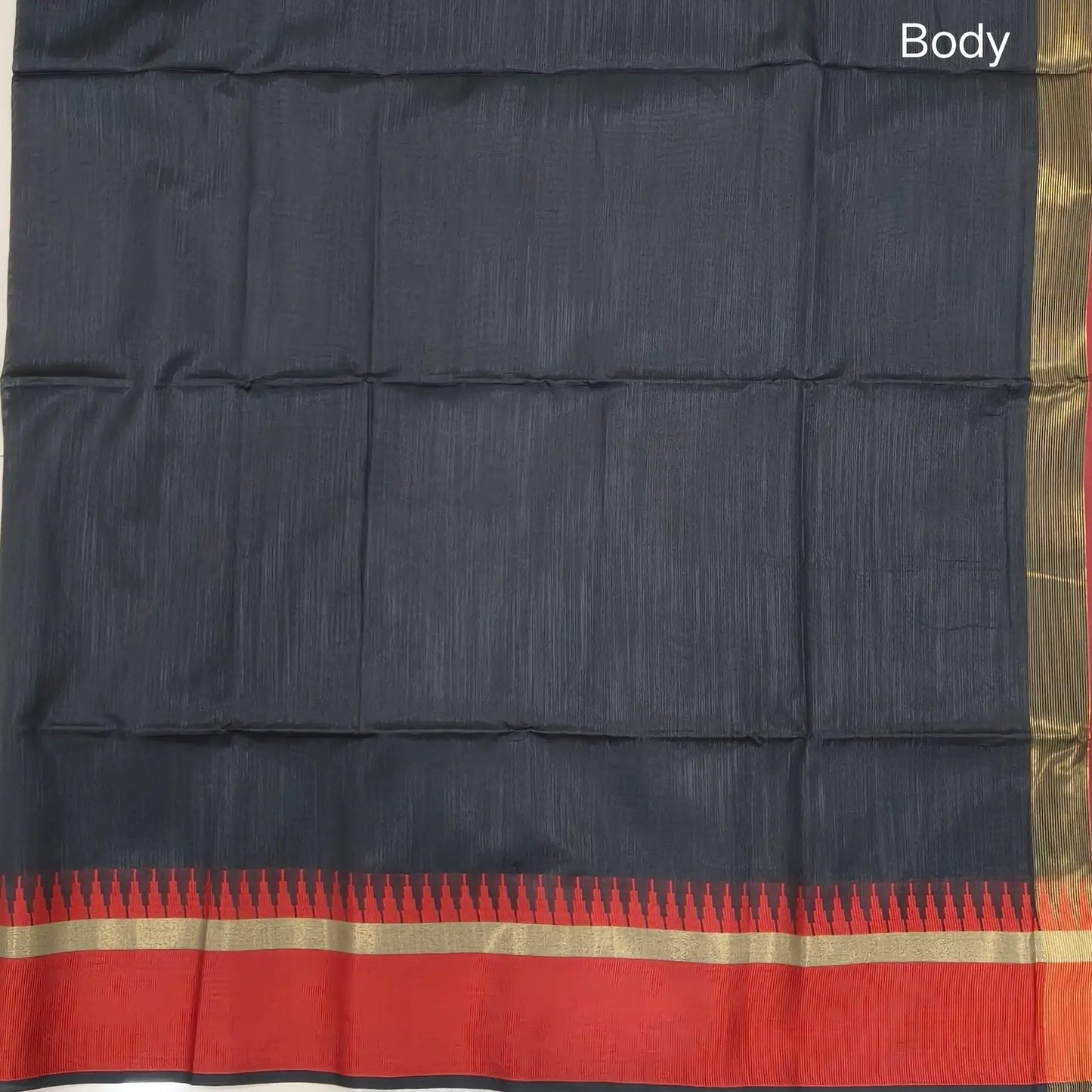 Black with maroon silk cotton saree with thread woven double side borders, zari striped short pallu and contrast blouse with borders. NS84