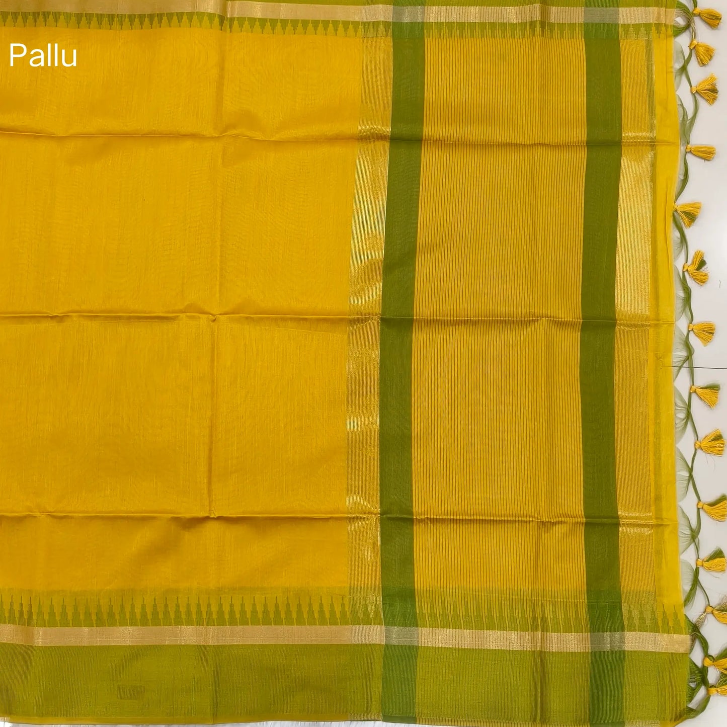 Mehandhi yellow with mossy green silk cotton saree with thread woven double side borders, zari striped short pallu and contrast blouse with borders. NS85